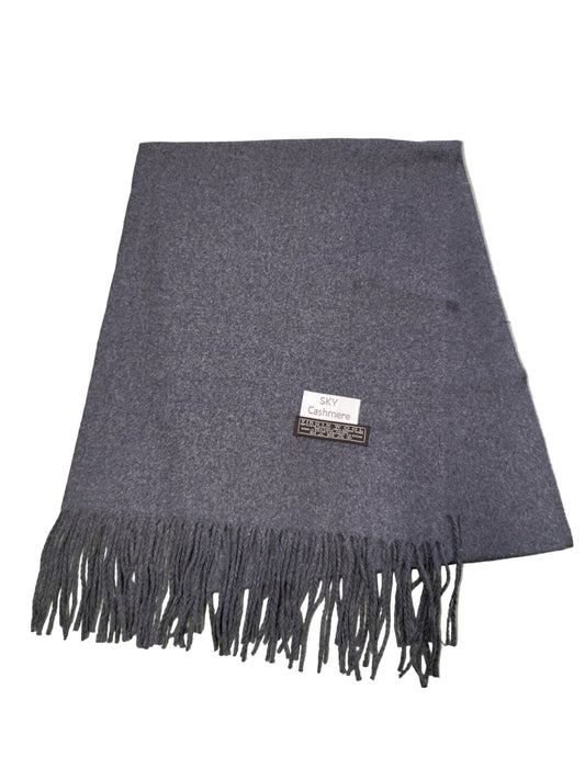 Gray scarf with fringes on a light gray floor