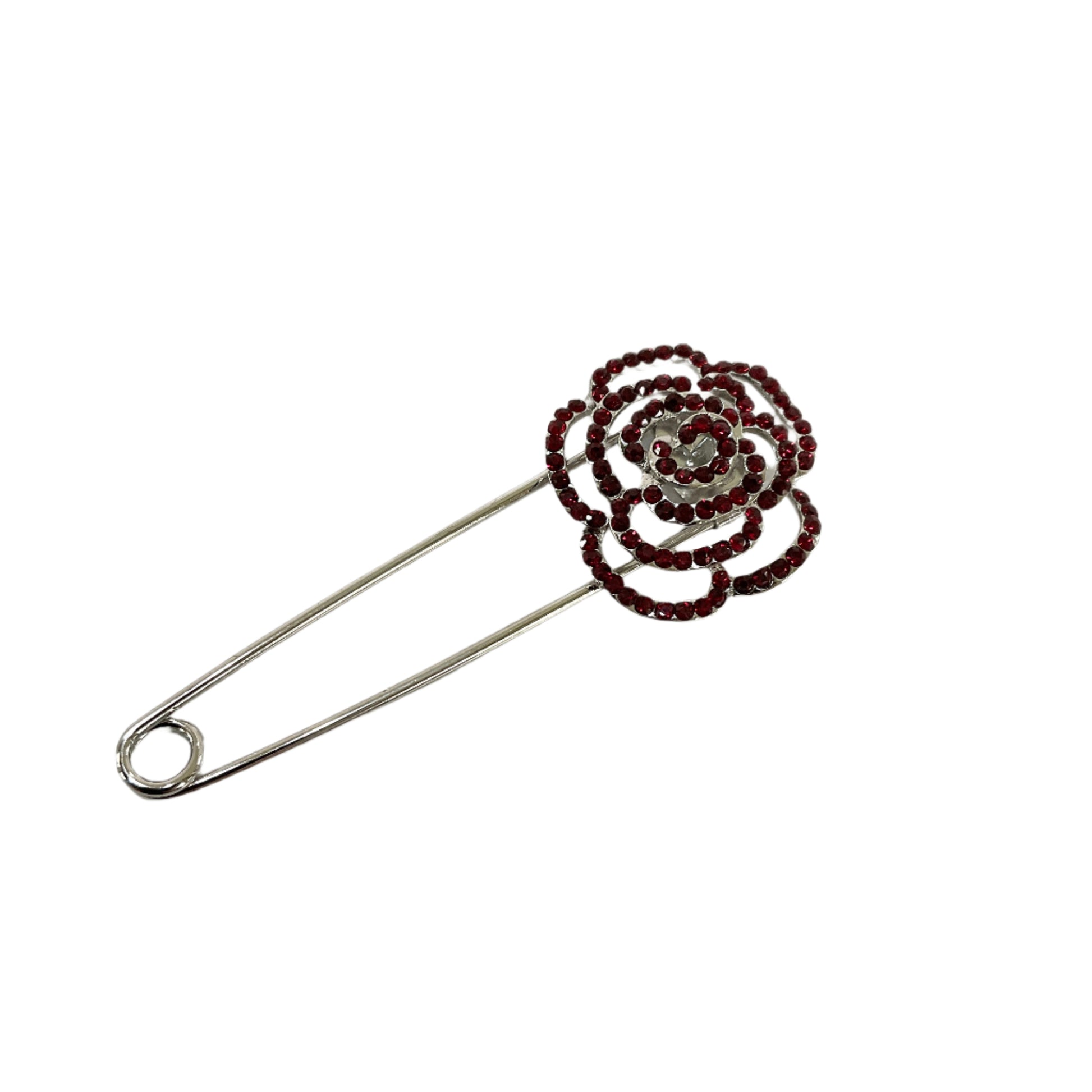 Beaded flower-shaped brooch on a white background