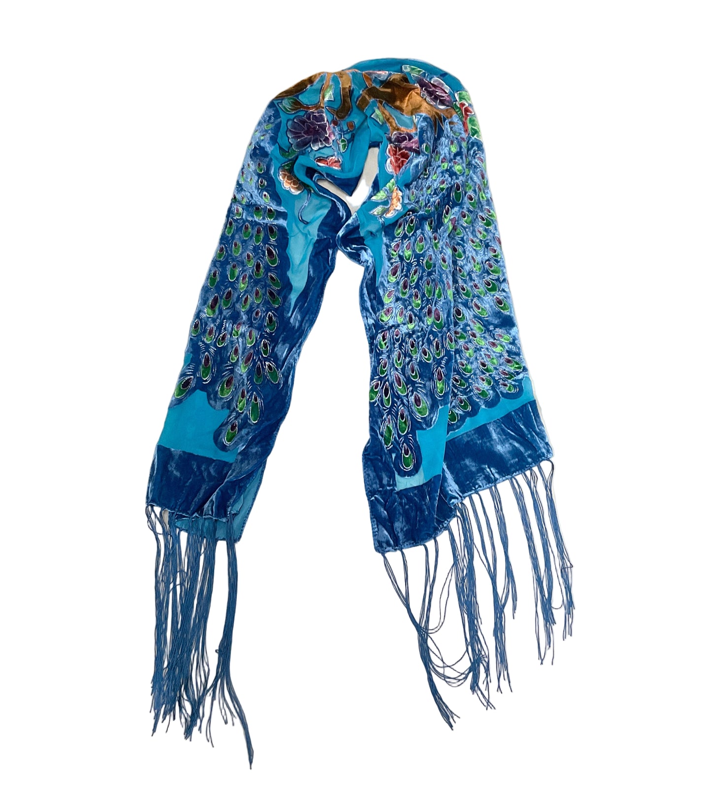 Blue scarf with fringe and intricate patterns on a white background
